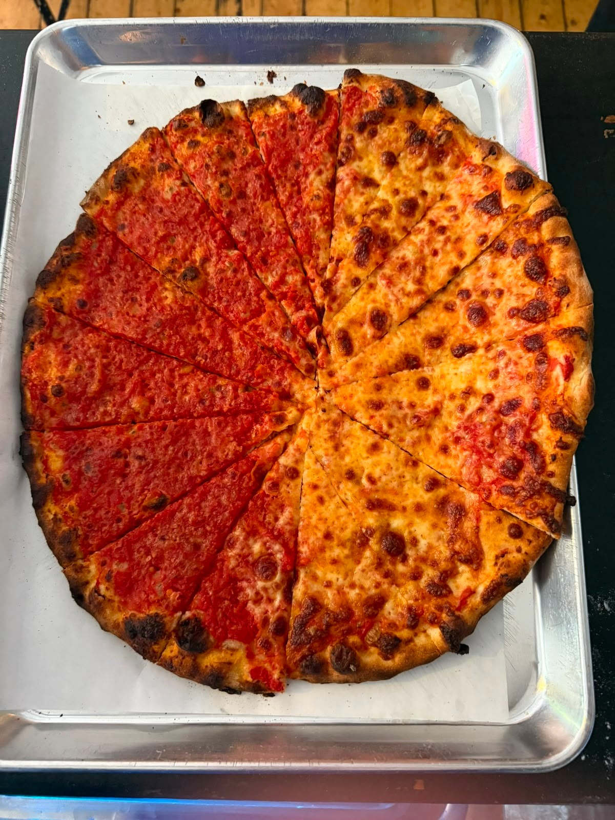 Freshly baked and sliced pizza from Lenny's